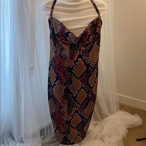 Size 10 snakeskin designed, fitted dress